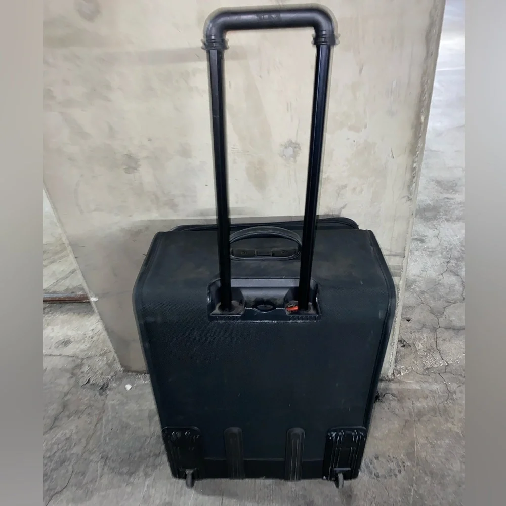 TUMI Check On Suitcase